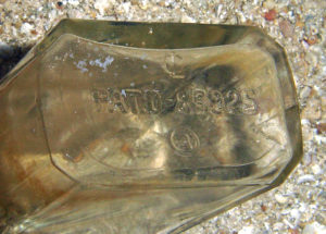 Patent number embossed on bottom of bottle